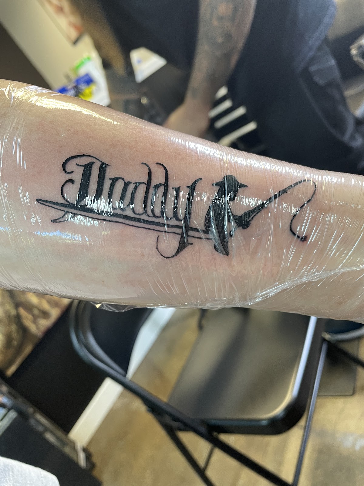 Custom script lettering tattoo