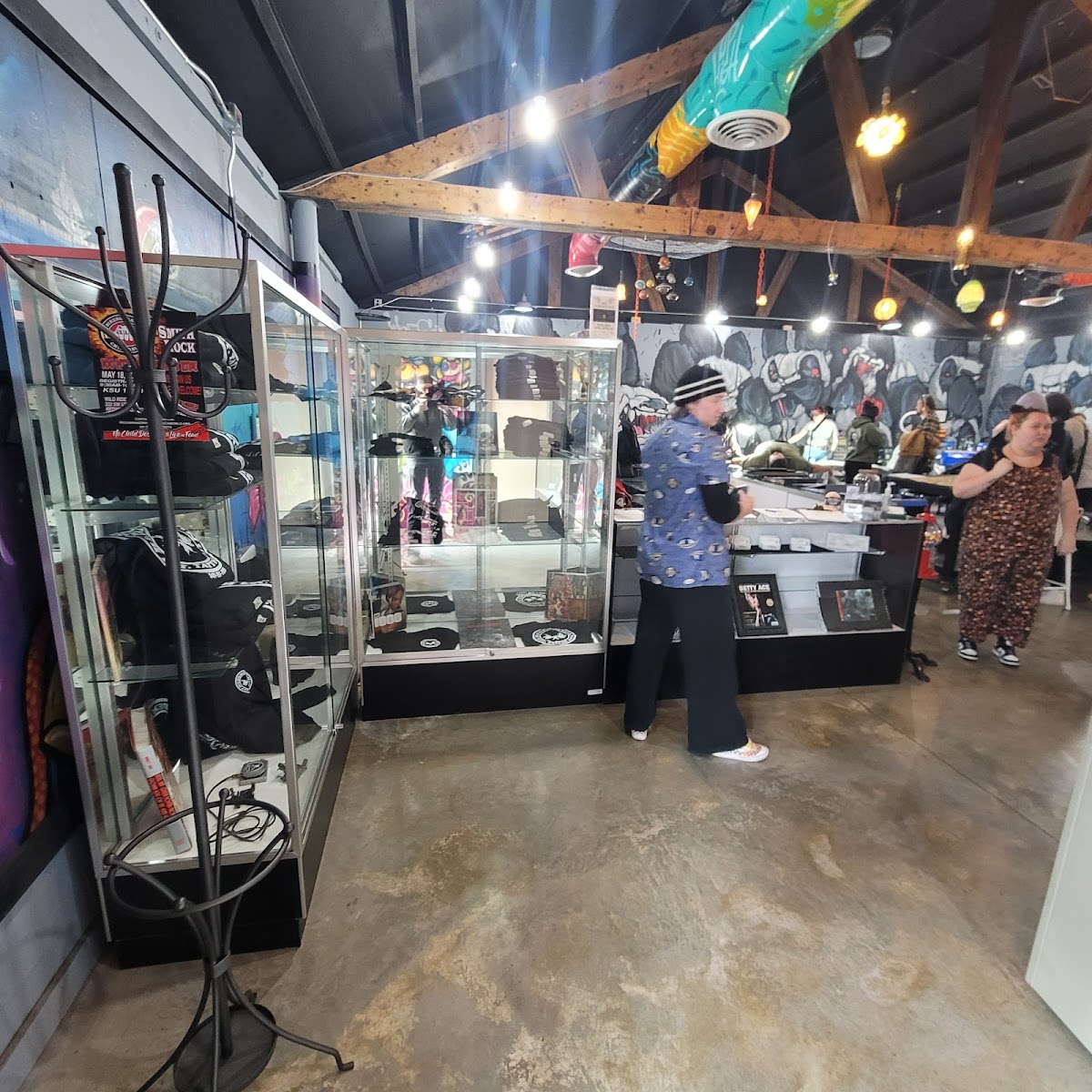 The front counter and merch at Redemption Tattoo